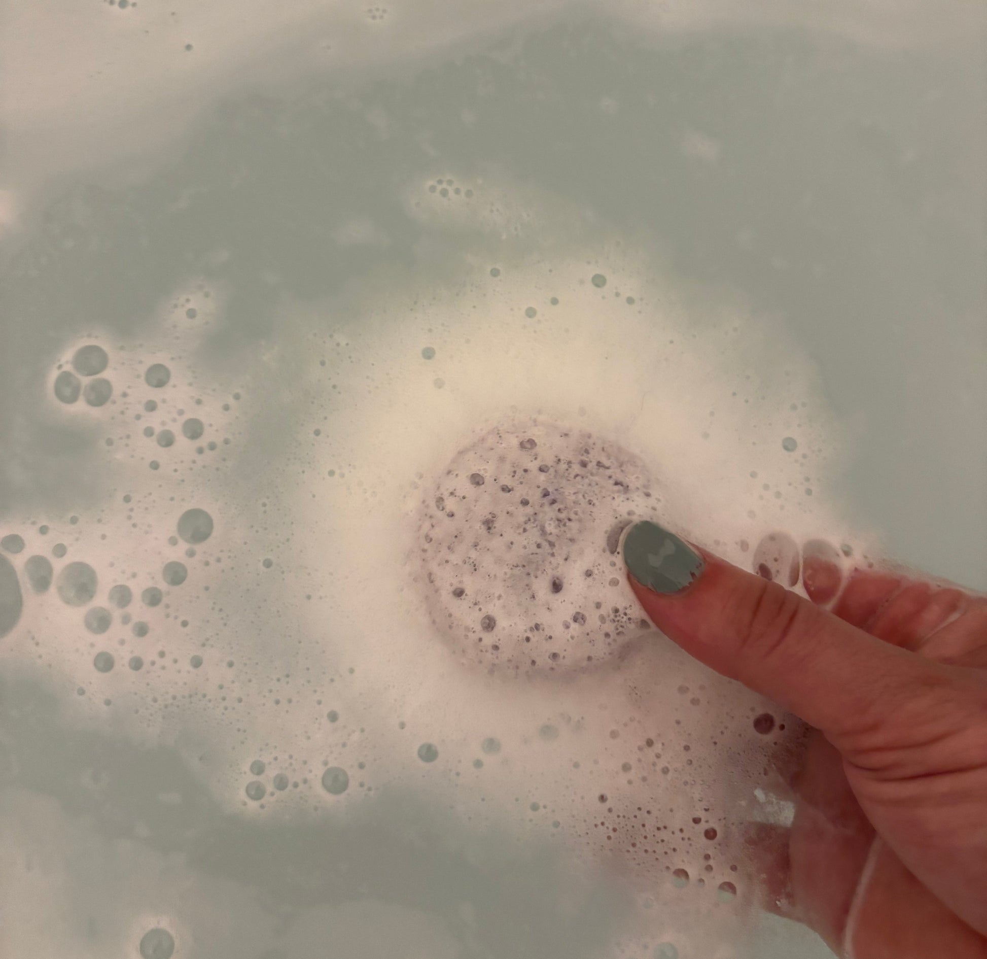 scentia essential oil chakra bath bombs fizzing in a bath